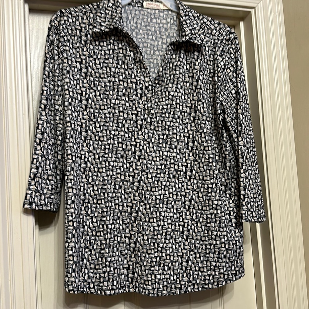 Women’s top made with polyester & spandex